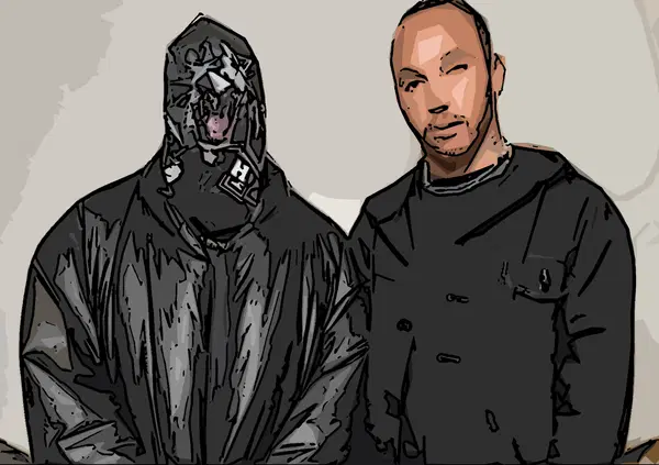 Hamilton alla sfilata di Balenciaga in compagnia... dell'uomo gatto. Ecco chi &egrave; il misterioso compagno