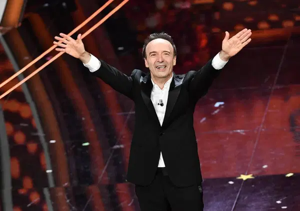 Roberto Benigni ospite a Sanremo 2025 con Geppi Cucciari co-conduttrice, ma &egrave; la serata in quota "de sinistra"? E perch&eacute; Carlo Conti non invita anche Fabrizio Corona? Intanto Elodie se ne "fotte" e anche noi di MOW...