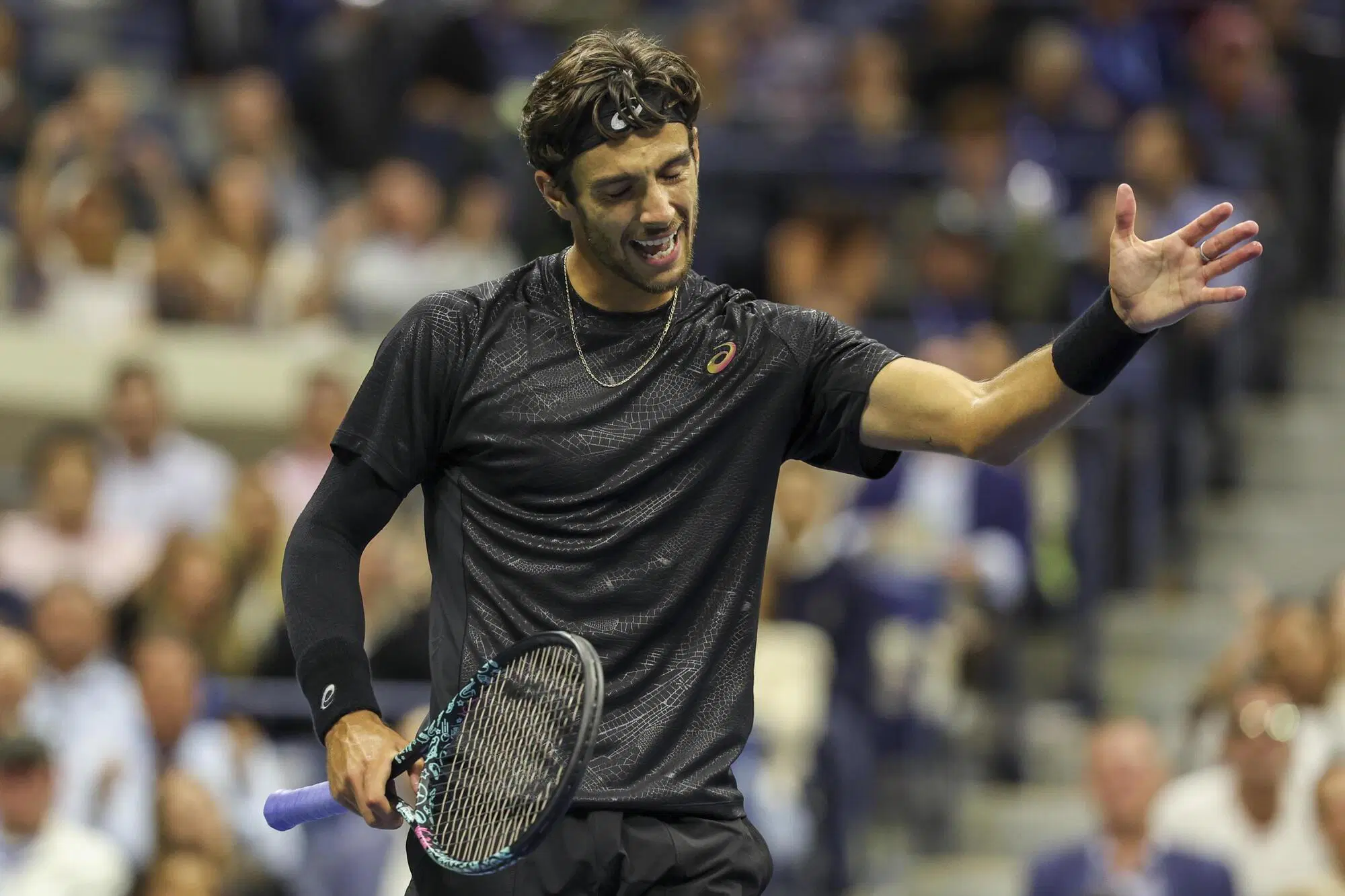 Un'invocazione di Lorenzo Musetti durante il match dei quarti dello Us Open 2025 contro Jannik Sinner